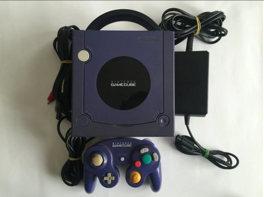 Nintendo GameCube console and controller showing the classic early 2000s design